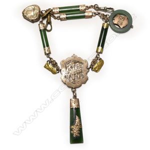 A 19th century gold and pounamu fancy fob necklace, festooned…
