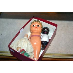 Small box of various celluloid dolls including rare black boy