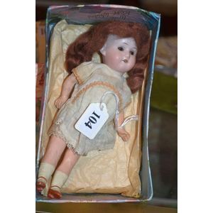 Welsch & Co. German 8 inch doll with bisque head, brown…