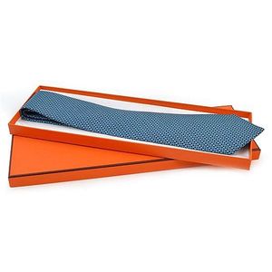 A silk tie by Hermes, the interlinking design in teal blue on a&hellip;