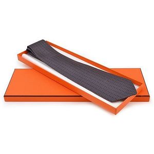 A silk tie by Hermes, styled with an interlinking in blue and&hellip;
