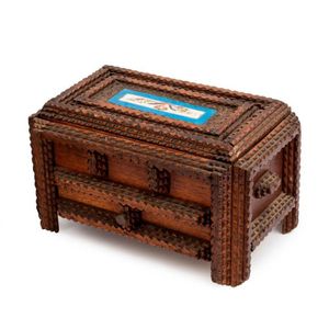 A carved cedar tramp art cigar box, 19th century with central…