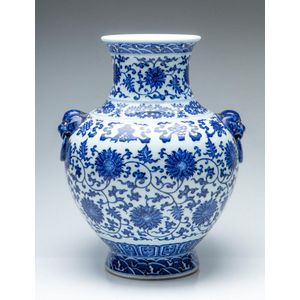 A Chinese blue and white Bajixiang vase decorated with Buddhist…
