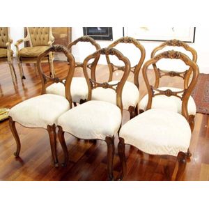 A set of six Victorian walnut balloon back chairs with carved&hellip;