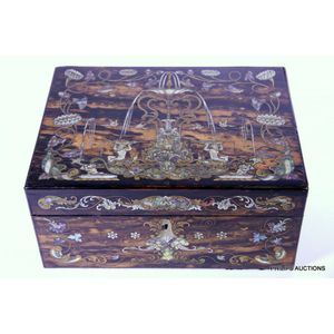 An inlaid Regency coromandel workbox, circa 1820-30, the…