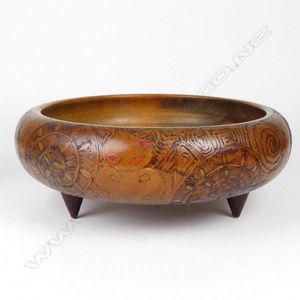 A mid-20th century Maori decorated wide circular bowl, the…