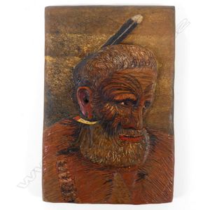 A Jane Brenkley panel portrait of a Maori chief, relief carved…