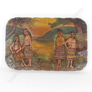 A Jane Brenkley carved and painted Maori themed table top/wall…