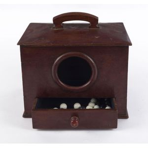 An Australian cedar ballot box with black and white marbles,…