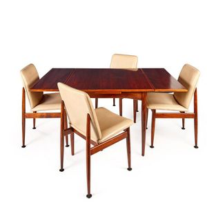 A drop-leaf dining table and four chairs, by Parker for Airest,…