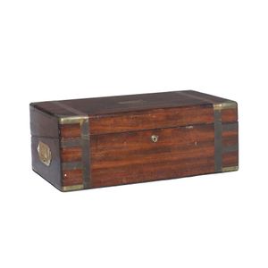 An Australia cedar brass-bound writing box, the hinged top…
