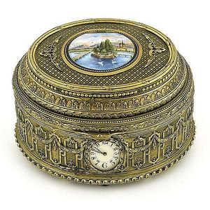 A Swiss gilt bronze singing bird automaton jewel box of oval…