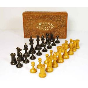 A Staunton design boxwood weighted chess set, c.1900, likely…