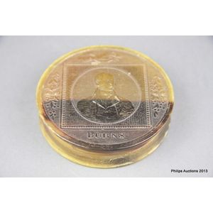 A Regency pressed horn snuff box, circa 1830, a circular box…