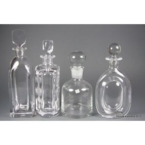 A group of four Scandinavian decanters, contemporary, two…