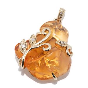 A Mexican fire opal and diamond pendant, 23 x 22 mm freeform…
