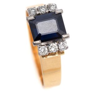 A vintage 18ct gold sapphire and diamond ring, curved collet…