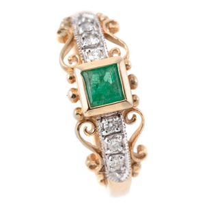 A 9ct gold emerald and diamond ring, rub set with a square cut…