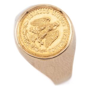 A Mexican gold coin ring, signet style ring in 14ct set with a…