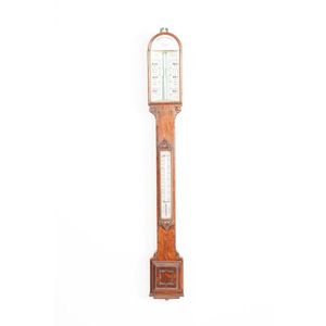 A late Victorian oak cased mercury stick barometer by Camerer…
