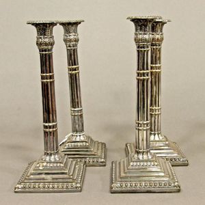 A set of four late 19th century Sheffield plate candlesticks…