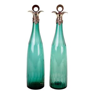 A pair of Victorian tall green glass and silver mounted…