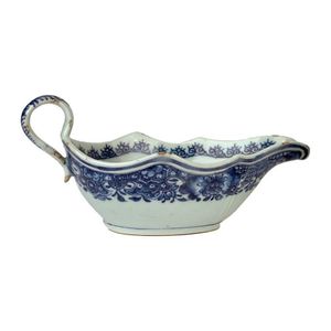 An 18th century Chinese Export ware porcelain gravy boat, of…