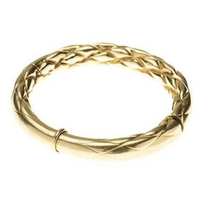 An 18ct gold hinged bangle, tapered stylised plait design to ...