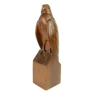 A carved wooden sculpture of a falcon, Continental, circa 1930.…