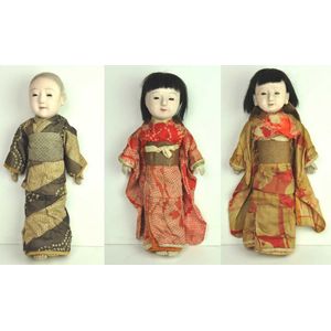Three Japanese painted lacquer dolls, approximately 48, 42 and…