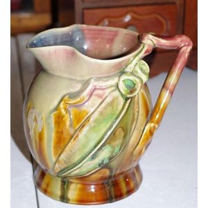 Australian pottery Remued jug with gum nuts as inspected, paper…