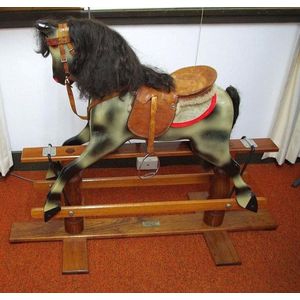 Carved timber rocking horse 'Made by James White', makers…