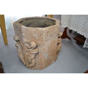 Cast composite planter, with inscriptions, cast in high relief…