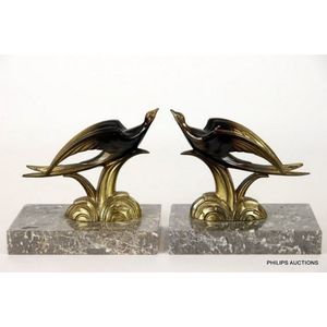 A pair of Art Deco spelter bird bookends, circa 1930, swallows…