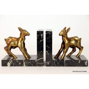 A pair of Art Deco spelter fawn bookends, circa 1930, in gold…