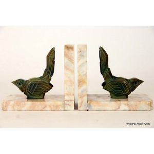 A pair of Art Deco spelter bird bookends, stylised geometric…