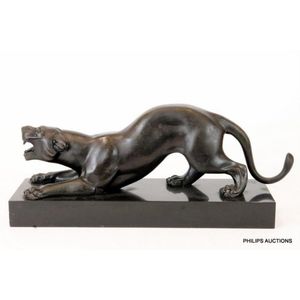 An Art Deco spelter panther, circa 1930s cast as a crouching…