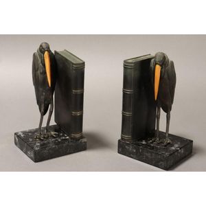 Pair of Art Deco bronze Marabou bookends, c.1920, depicted with…