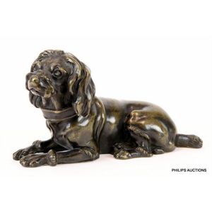 A bronze figure of a King Charles spaniel, circa 1930, the…