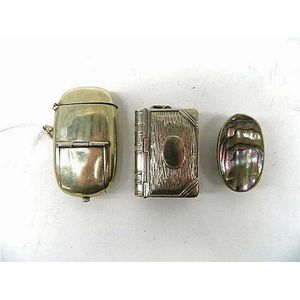 Silver plate novelty book form vesta box together with vesta…