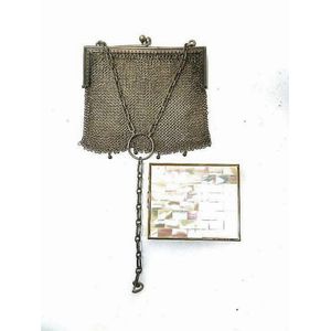 An early 20th century chain purse, together with a mother of…