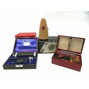 A C1950 Taktelg Metronome, together with Realistic music sound…