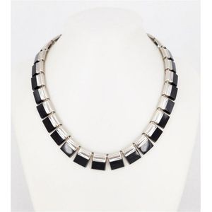 A Taxco sterling silver and black onyx necklace, marked Taxco,…