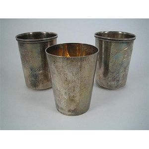 Three Russian silver beakers, a pair engraved in Art Nouveau…