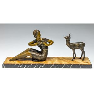 After Chiparus, an Art Deco style lady and doe on marble base,…