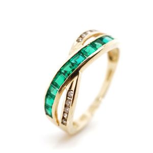 Diamond and created emerald set 9ct yellow gold ring. Marked…