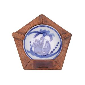 Chinese porcelain sauce dish, encased within a wood frame for…