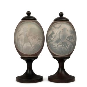A pair of carved emu eggs with Aboriginal hunting scene and…