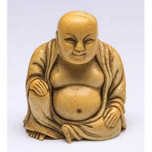 Carved ivory Oriental Buddha - price guide and values