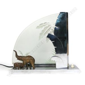 An Art Deco chrome and bronze elephant table lamp, the quarter…